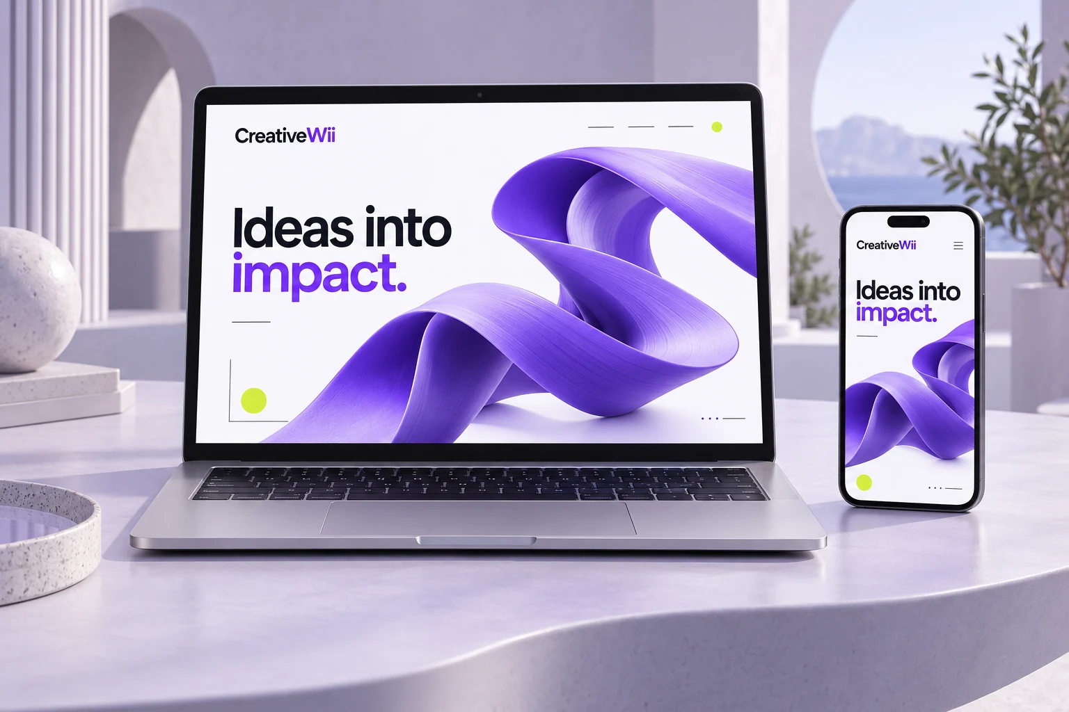 CreativeWii responsive website concept displayed on a laptop and phone.
